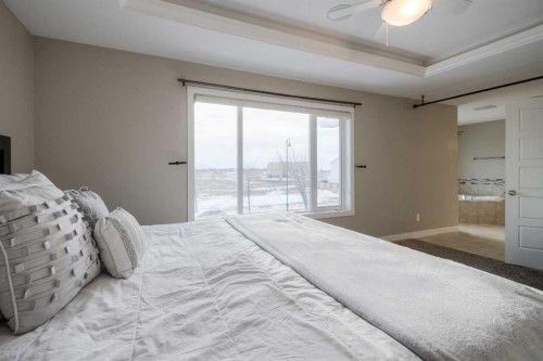 541 Aquitania Boulevard West, Lethbridge, AB - Indoor Photo Showing Bedroom