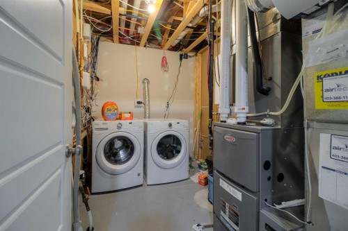 541 Aquitania Boulevard West, Lethbridge, AB - Indoor Photo Showing Laundry Room