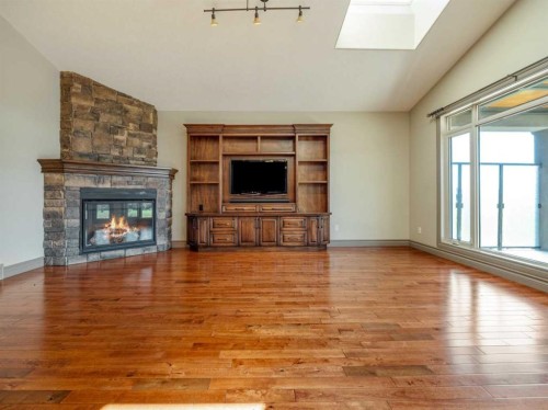 629 Southgate Boulevard South, Lethbridge, AB - Indoor Photo Showing Living Room With Fireplace