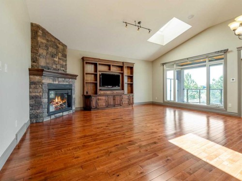 629 Southgate Boulevard South, Lethbridge, AB - Indoor Photo Showing Living Room With Fireplace