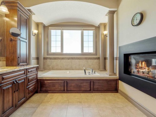 629 Southgate Boulevard South, Lethbridge, AB - Indoor Photo Showing Bathroom With Fireplace
