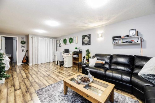 3325 42 Avenue, Red Deer, AB - Indoor Photo Showing Living Room