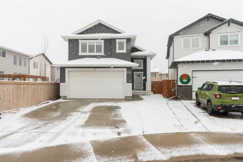 207 Moonlight Cove West, Lethbridge, AB - Outdoor With Facade