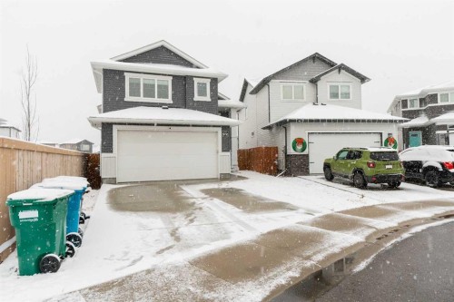 207 Moonlight Cove West, Lethbridge, AB - Outdoor With Facade