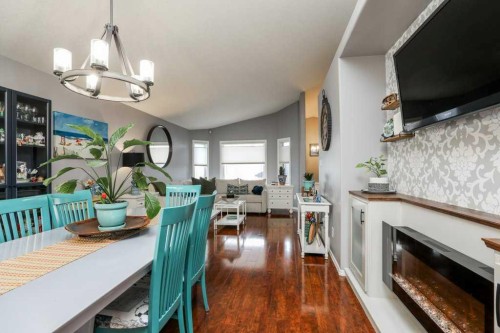 4817 7 Street, Coalhurst, AB - Indoor Photo Showing Dining Room With Fireplace
