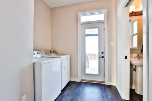 870 Greywolf Run North, Lethbridge, AB - Indoor Photo Showing Laundry Room