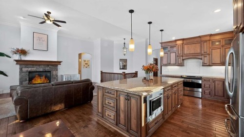 305 Lyndon Road, Fort Macleod, AB - Indoor Photo Showing Kitchen With Fireplace With Stainless Steel Kitchen With Upgraded Kitchen