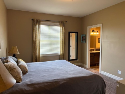 217 6 Avenue, Stirling, AB - Indoor Photo Showing Bedroom