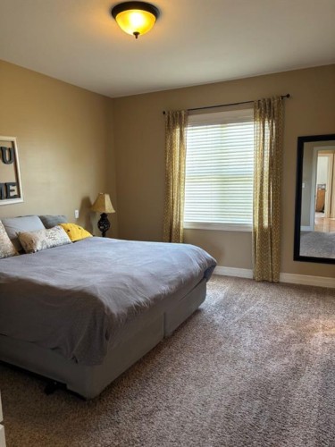 217 6 Avenue, Stirling, AB - Indoor Photo Showing Bedroom