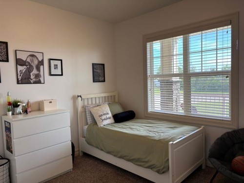 217 6 Avenue, Stirling, AB - Indoor Photo Showing Bedroom