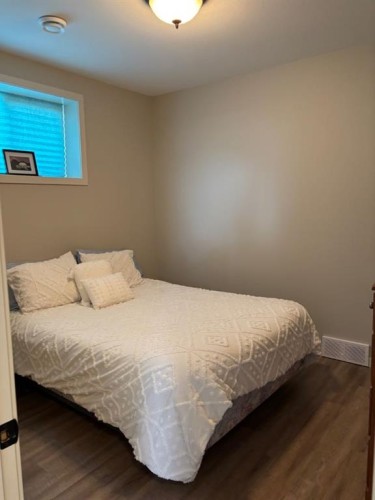 217 6 Avenue, Stirling, AB - Indoor Photo Showing Bedroom