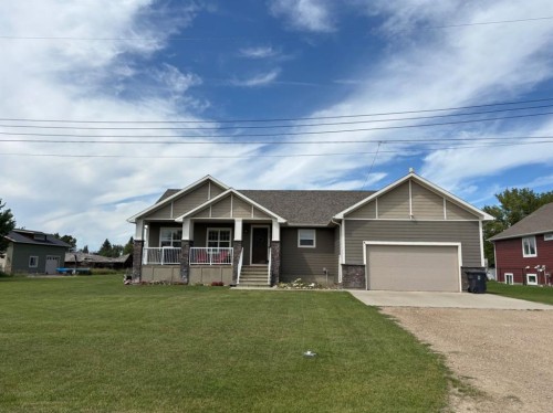 217 6 Avenue, Stirling, AB - Outdoor With Deck Patio Veranda With Facade