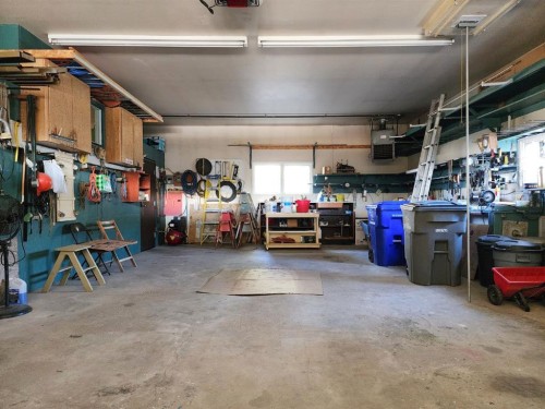 112 43 Avenue West, Claresholm, AB - Indoor Photo Showing Garage