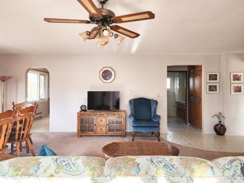 112 43 Avenue West, Claresholm, AB - Indoor Photo Showing Living Room