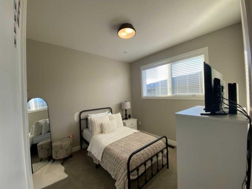 4237 60 Avenue, Taber, AB - Indoor Photo Showing Bedroom