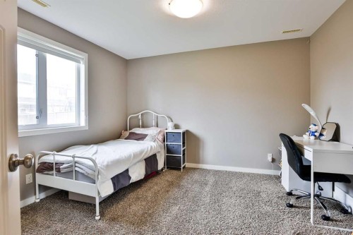 93 Riverine Lane West, Lethbridge, AB - Indoor Photo Showing Bedroom