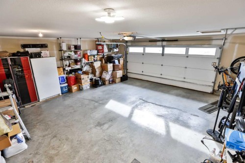 93 Riverine Lane West, Lethbridge, AB - Indoor Photo Showing Garage