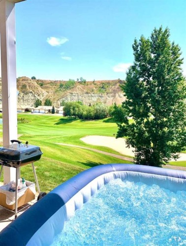 B-410 Canyon Boulevard West, Lethbridge, AB - Outdoor With Backyard