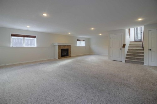 11 Cougar Cove North, Lethbridge, AB - Indoor With Fireplace