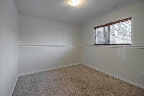 11 Cougar Cove North, Lethbridge, AB - Indoor Photo Showing Other Room