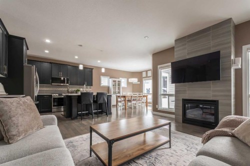 172 Firelight Way West, Lethbridge, AB - Indoor Photo Showing Living Room With Fireplace