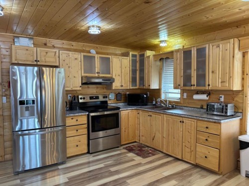 26 Mount Vista Drive, Hill Spring, AB - Indoor Photo Showing Kitchen With Double Sink