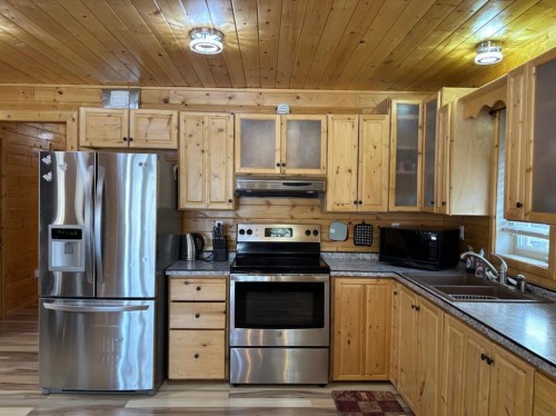26 Mount Vista Drive, Hill Spring, AB - Indoor Photo Showing Kitchen With Double Sink