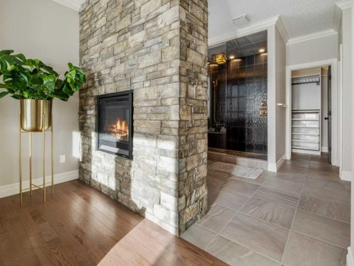 182 Canyon Estates Way West, Lethbridge, AB - Indoor Photo Showing Other Room With Fireplace