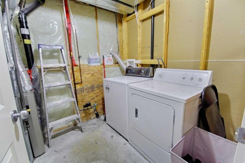 210 Keystone Lane West, Lethbridge, AB - Indoor Photo Showing Laundry Room