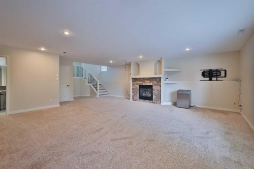74 Rivermont Crescent West, Lethbridge, AB - Indoor With Fireplace