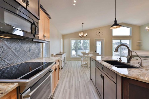 74 Rivermont Crescent West, Lethbridge, AB - Indoor Photo Showing Kitchen With Double Sink With Upgraded Kitchen