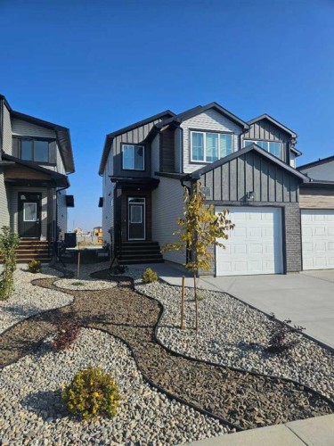 4345 31 Avenue South, Lethbridge, AB - Outdoor With Facade