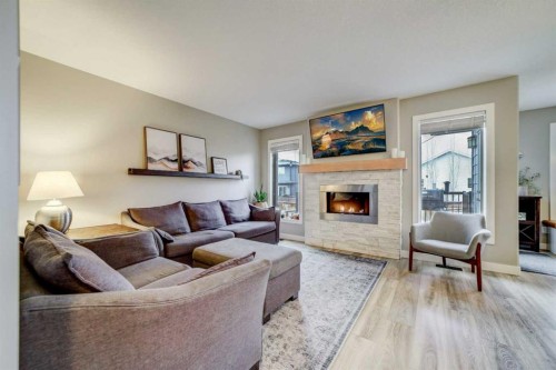 514 Devonia Road West, Lethbridge, AB - Indoor Photo Showing Living Room With Fireplace