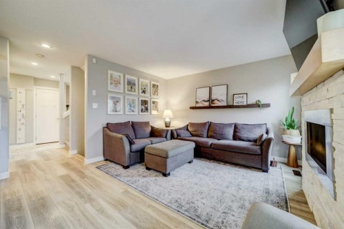 514 Devonia Road West, Lethbridge, AB - Indoor Photo Showing Living Room With Fireplace