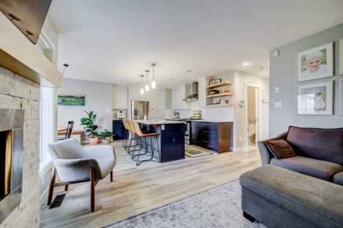 514 Devonia Road West, Lethbridge, AB - Indoor Photo Showing Living Room With Fireplace