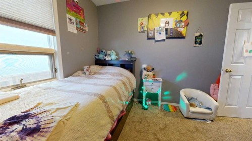 713 19 Street South, Lethbridge, AB - Indoor Photo Showing Bedroom