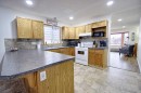 46 Heritage Crescent West, Lethbridge, AB  - Indoor Photo Showing Kitchen With Double Sink 