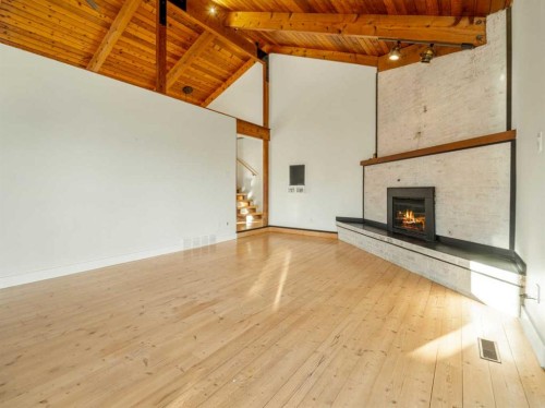 101 3 Street South, Picture Butte, AB - Indoor Photo Showing Living Room With Fireplace