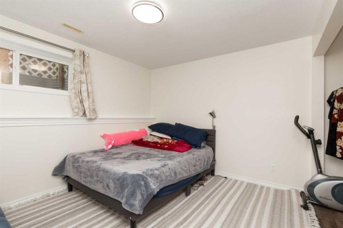 619 Florence Ho Leong Crescent North, Lethbridge, AB - Indoor Photo Showing Bedroom