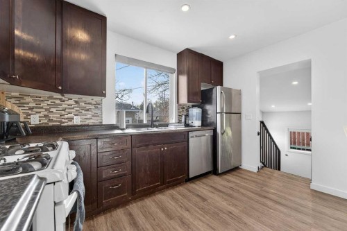 1305 20 Avenue, Coaldale, AB - Indoor Photo Showing Kitchen With Double Sink