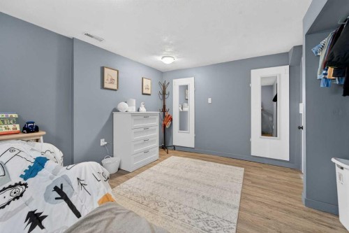 1305 20 Avenue, Coaldale, AB - Indoor Photo Showing Bedroom