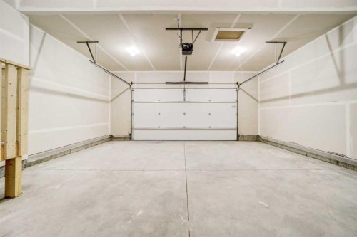 413 Rivergrove Chase West, Lethbridge, AB - Indoor Photo Showing Garage