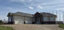 8 Grasslands Road, Rural Taber, M.D. Of, AB  - Outdoor With Facade 