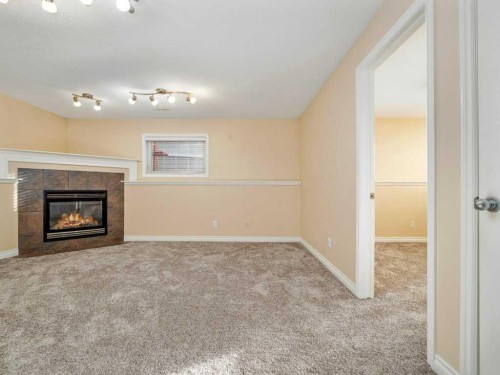 468 Heritage Boulevard West, Lethbridge, AB - Indoor With Fireplace
