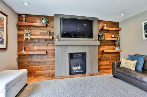 234 Mcmaster Boulevard West, Lethbridge, AB - Indoor Photo Showing Living Room With Fireplace