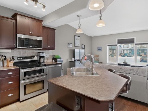 645 Silkstone Point West, Lethbridge, AB - Indoor Photo Showing Kitchen With Double Sink