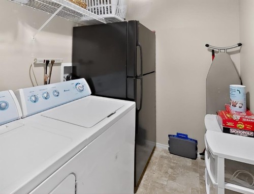 645 Silkstone Point West, Lethbridge, AB - Indoor Photo Showing Laundry Room
