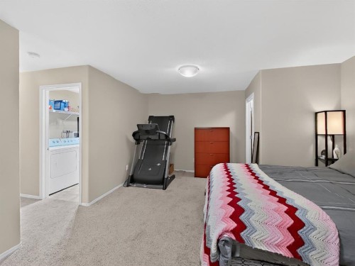 645 Silkstone Point West, Lethbridge, AB - Indoor Photo Showing Bedroom