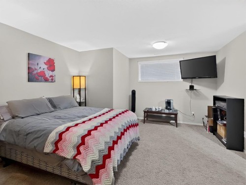 645 Silkstone Point West, Lethbridge, AB - Indoor Photo Showing Bedroom