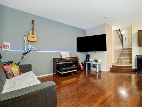757 Silkstone Close West, Lethbridge, AB - Indoor Photo Showing Other Room With Fireplace